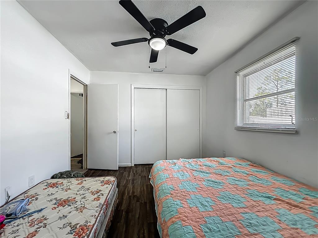 20 Lake Ct Loop Ocala, FL 34472 - Photo 14 of 33 a bedroom with a bed and a window