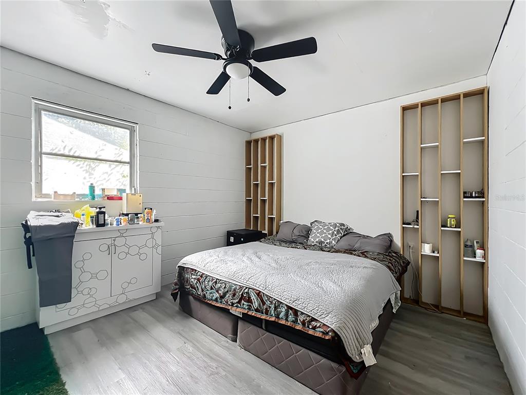 20 Lake Ct Loop Ocala, FL 34472 - Photo 18 of 33 a bedroom with a bed and a dresser