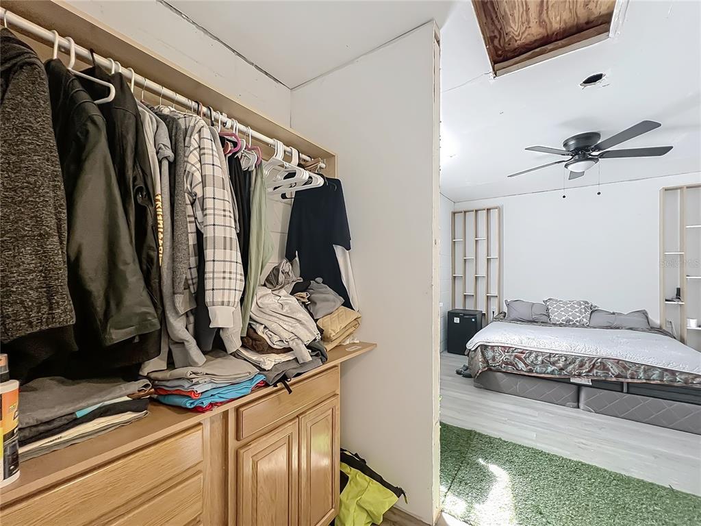 20 Lake Ct Loop Ocala, FL 34472 - Photo 19 of 33 a bedroom with a bed and a window