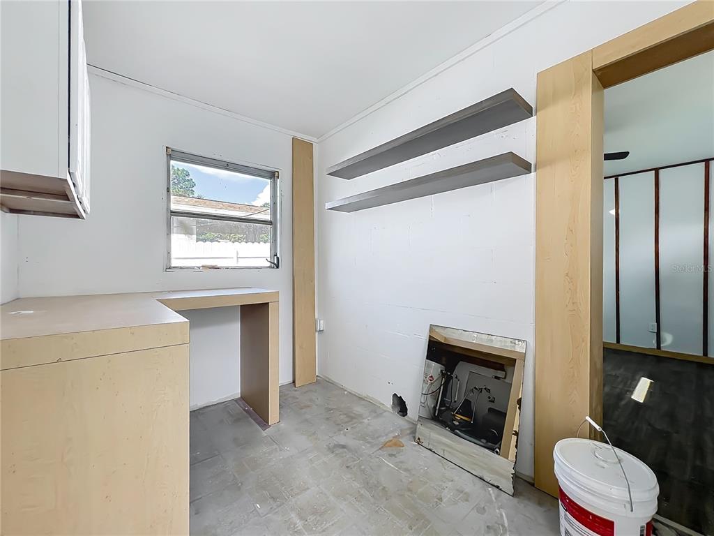 20 Lake Ct Loop Ocala, FL 34472 - Photo 22 of 33 a bathroom with a toilet a sink and a window