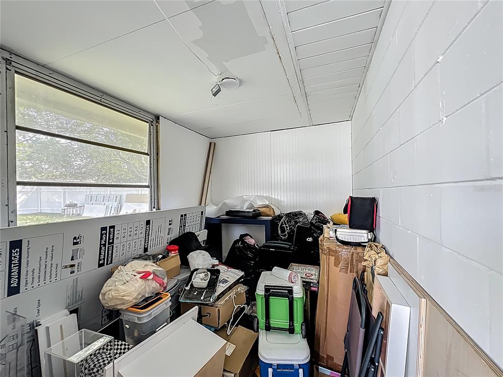 20 Lake Ct Loop Ocala, FL 34472 - Photo 24 of 33 a bedroom with furniture and a window