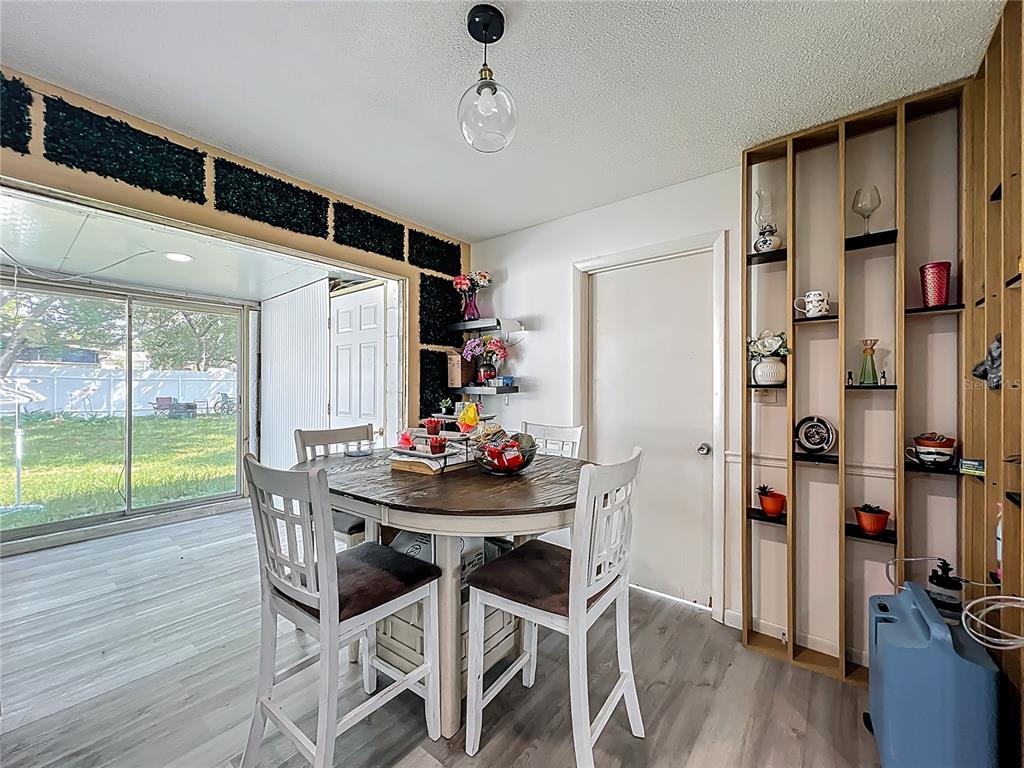 20 Lake Ct Loop Ocala, FL 34472 - Photo 10 of 33 a dining room with furniture and wooden floor