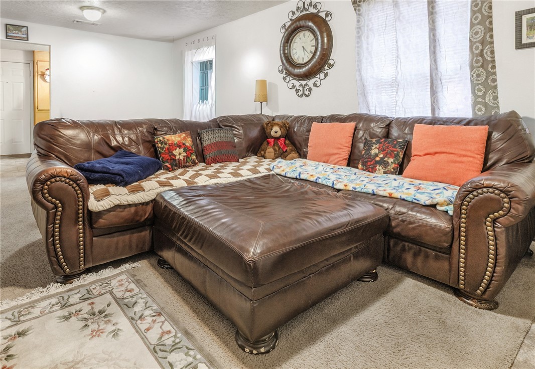 1012 Columbus Avenue Bryan, TX 77803 - Photo 2 of 9 a living room with furniture and a couch