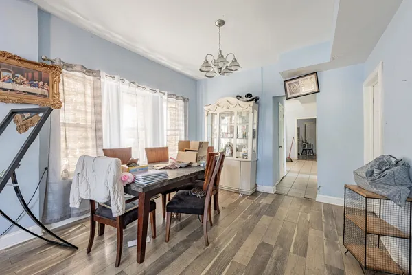 a view of a dining room with furniture window and outside view