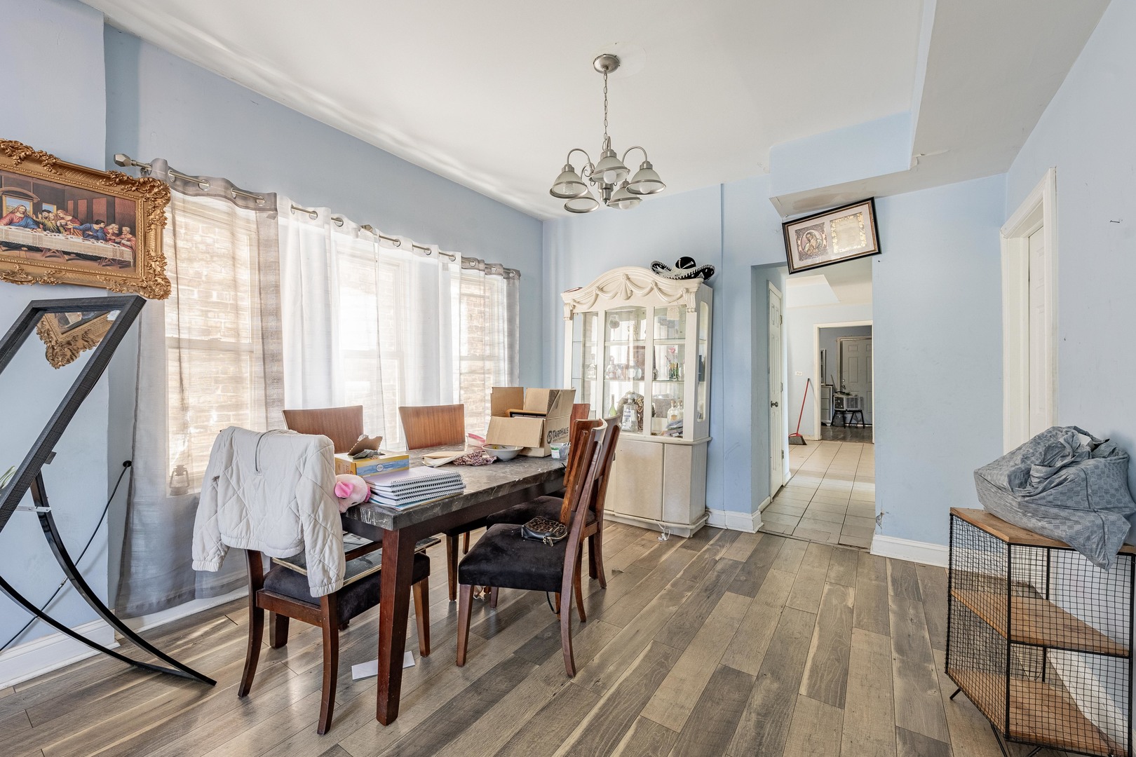 1638 South Pulaski Road Chicago, IL 60623 - Photo 13 of 22 a view of a dining room with furniture window and outside view