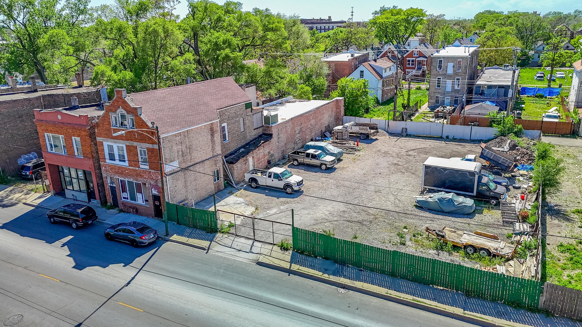 1638 South Pulaski Road Chicago, IL 60623 - Photo 2 of 22 an aerial view of a house with porch and garden