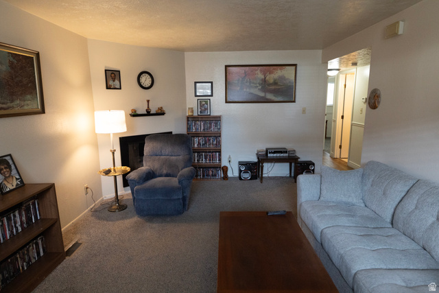 314 West Center Street, Unit A83 Bountiful, UT 84010 - Photo 7 of 19 Living room with carpet floors