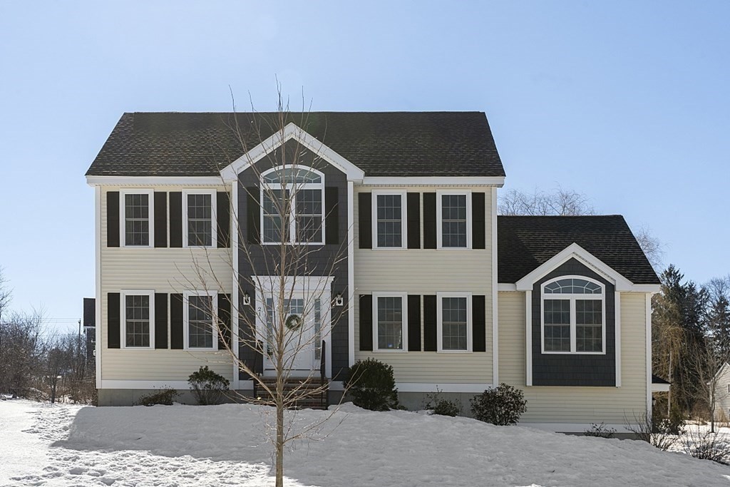 21 Butternut Road Dracut, MA 01826 - Photo 1 of 28 a front view of a house