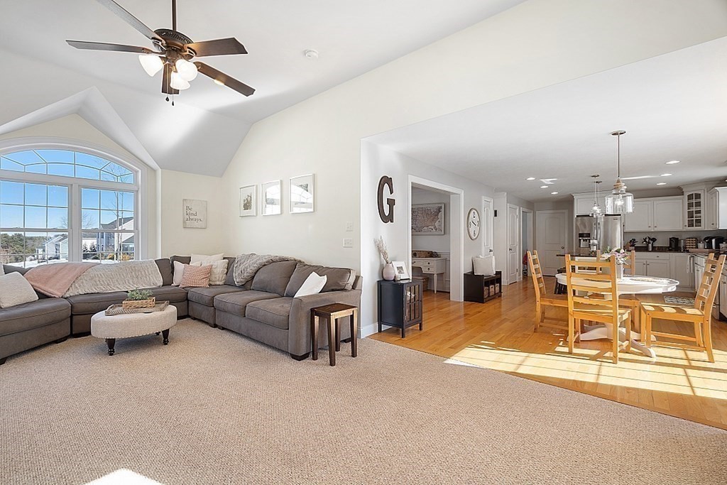 21 Butternut Road Dracut, MA 01826 - Photo 12 of 28 a living room with furniture and a large window
