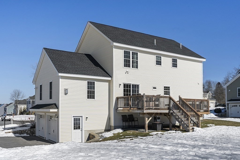 21 Butternut Road Dracut, MA 01826 - Photo 27 of 28 a view of a house with a barbeque