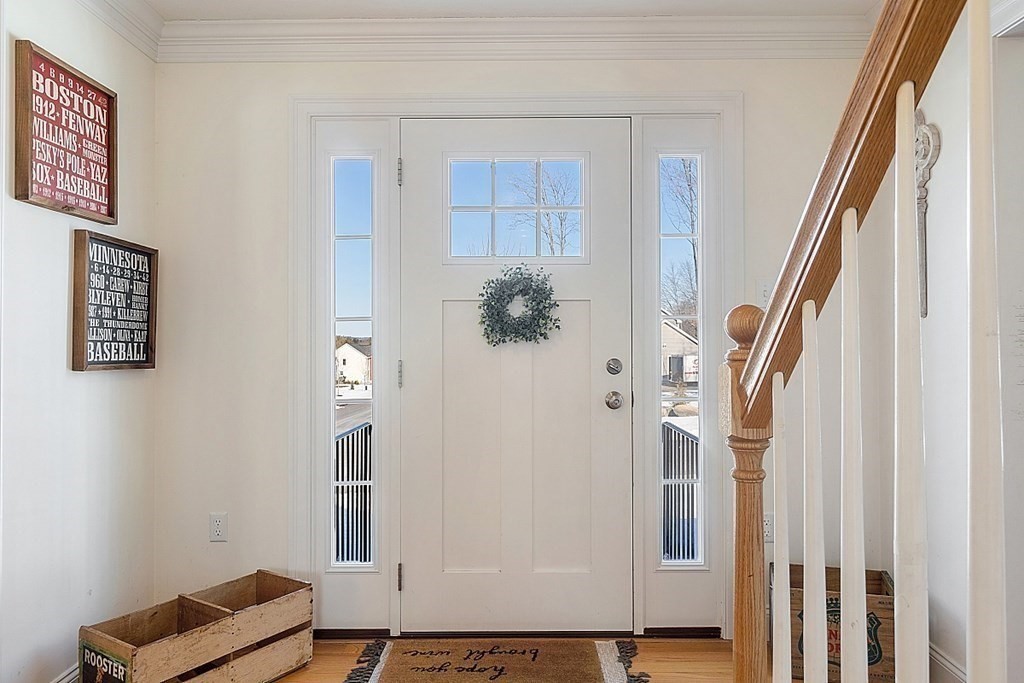 21 Butternut Road Dracut, MA 01826 - Photo 4 of 28 a view of entryway with wooden floor and stairs