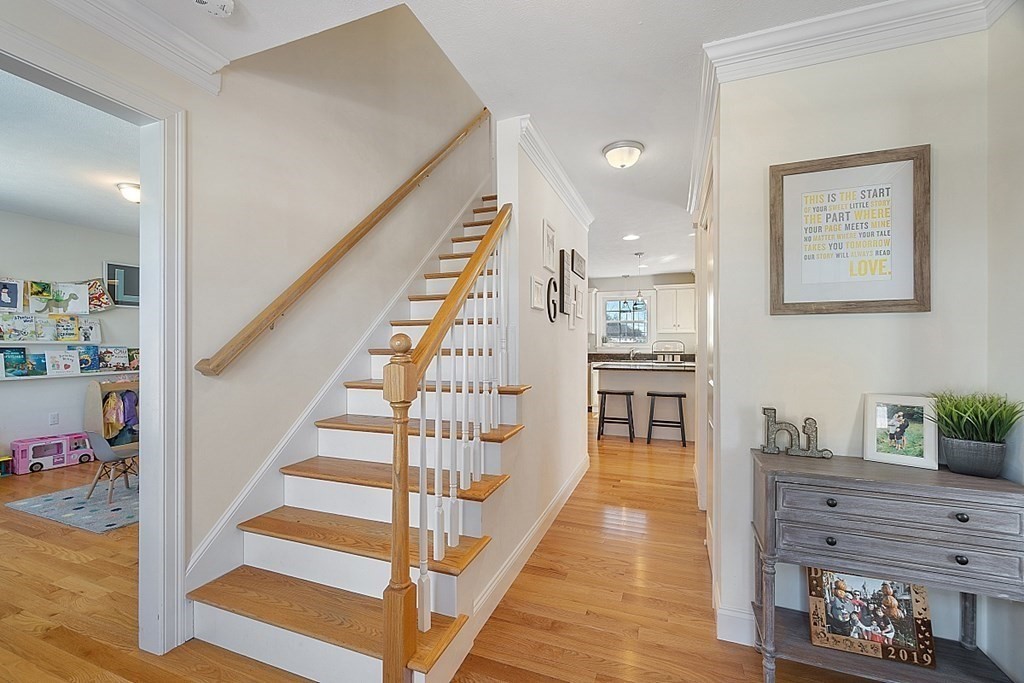21 Butternut Road Dracut, MA 01826 - Photo 5 of 28 a view of entryway and hall with wooden floor