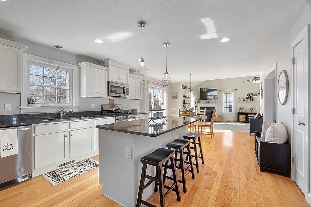21 Butternut Road Dracut, MA 01826 - Photo 7 of 28 a large kitchen with lots of counter space a sink and appliances