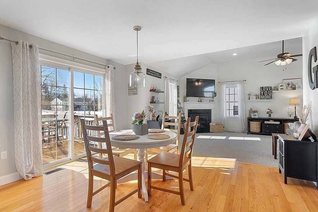 21 Butternut Road Dracut, MA 01826 - Photo 8 of 28 a view of a dining room with furniture window and wooden floor
