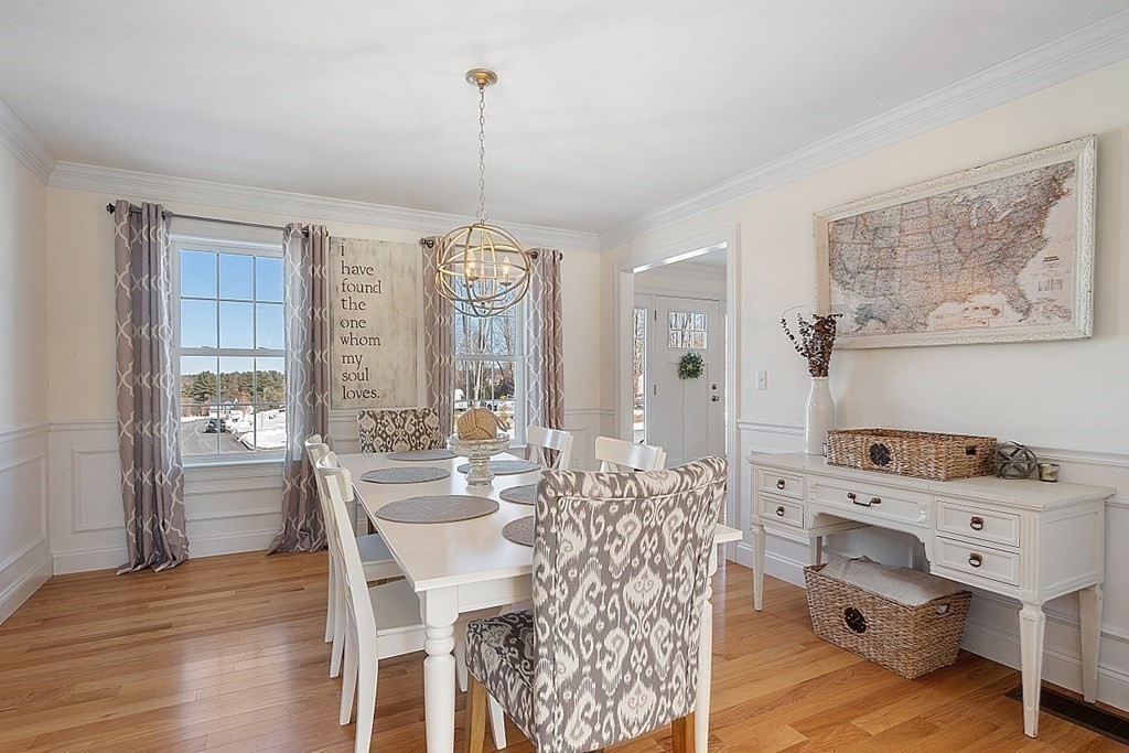 21 Butternut Road Dracut, MA 01826 - Photo 10 of 28 a very nice looking dining room with a table and chairs