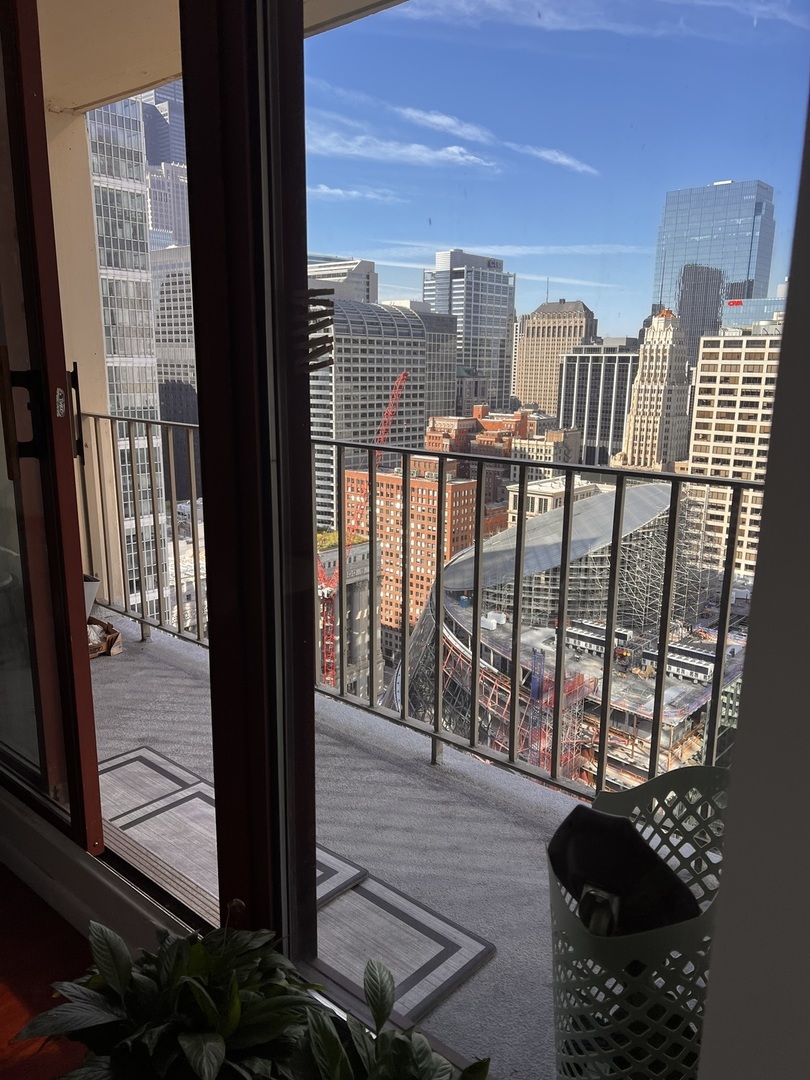 200 North Dearborn Street, Unit 4401 Chicago, IL 60601 - Photo 7 of 8 a view of a balcony with an outdoor space