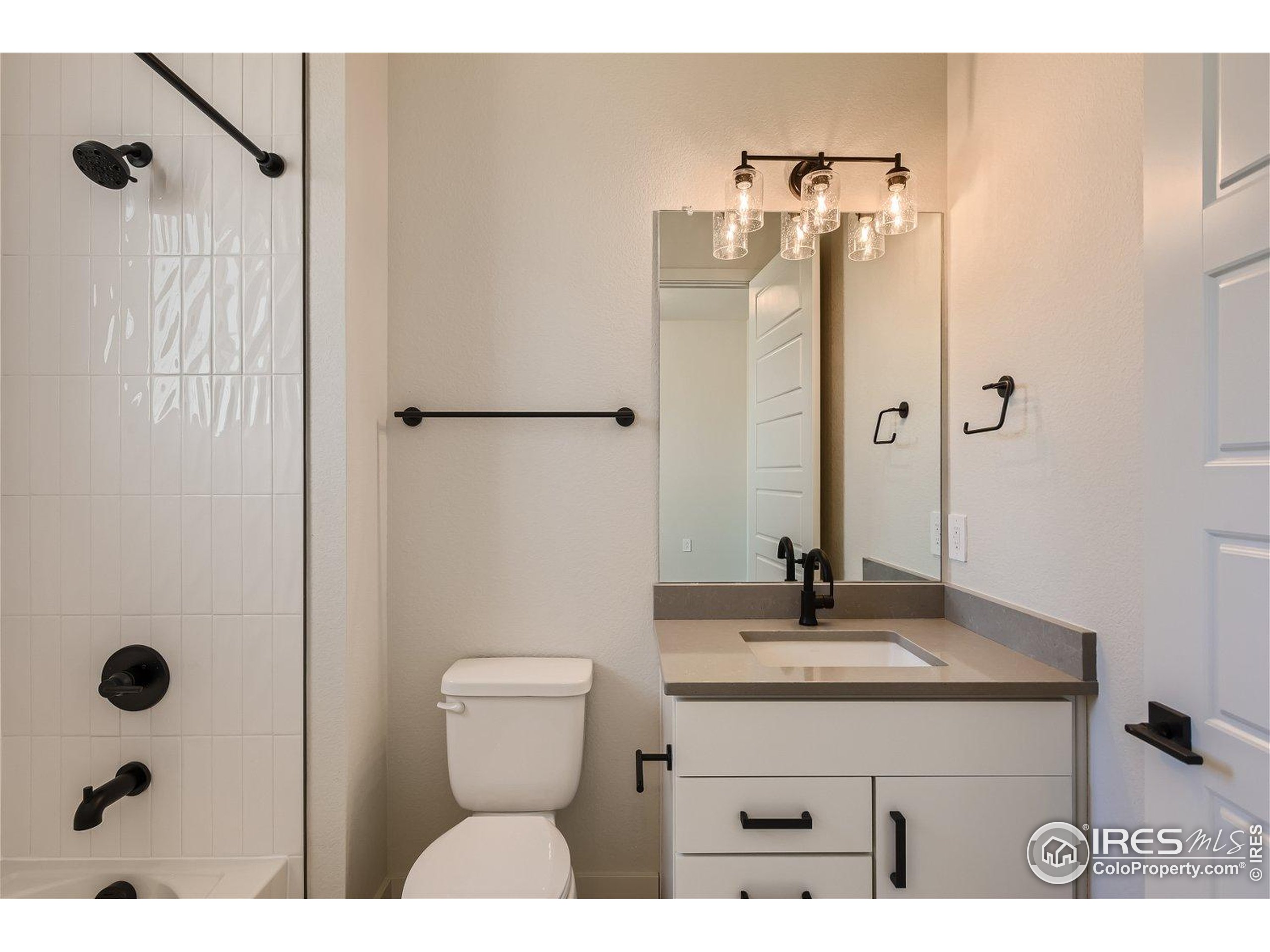 1726 Morningstar Way Fort Collins, CO 80524 - Photo 19 of 29 a bathroom with a sink a toilet and shower