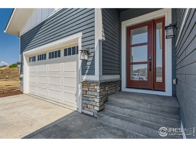 a view of house with backyard
