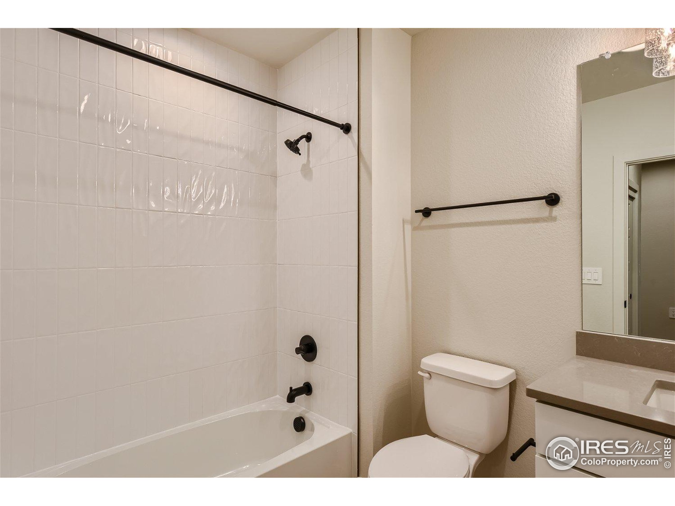 1726 Morningstar Way Fort Collins, CO 80524 - Photo 24 of 29 a bathroom with a toilet and a shower