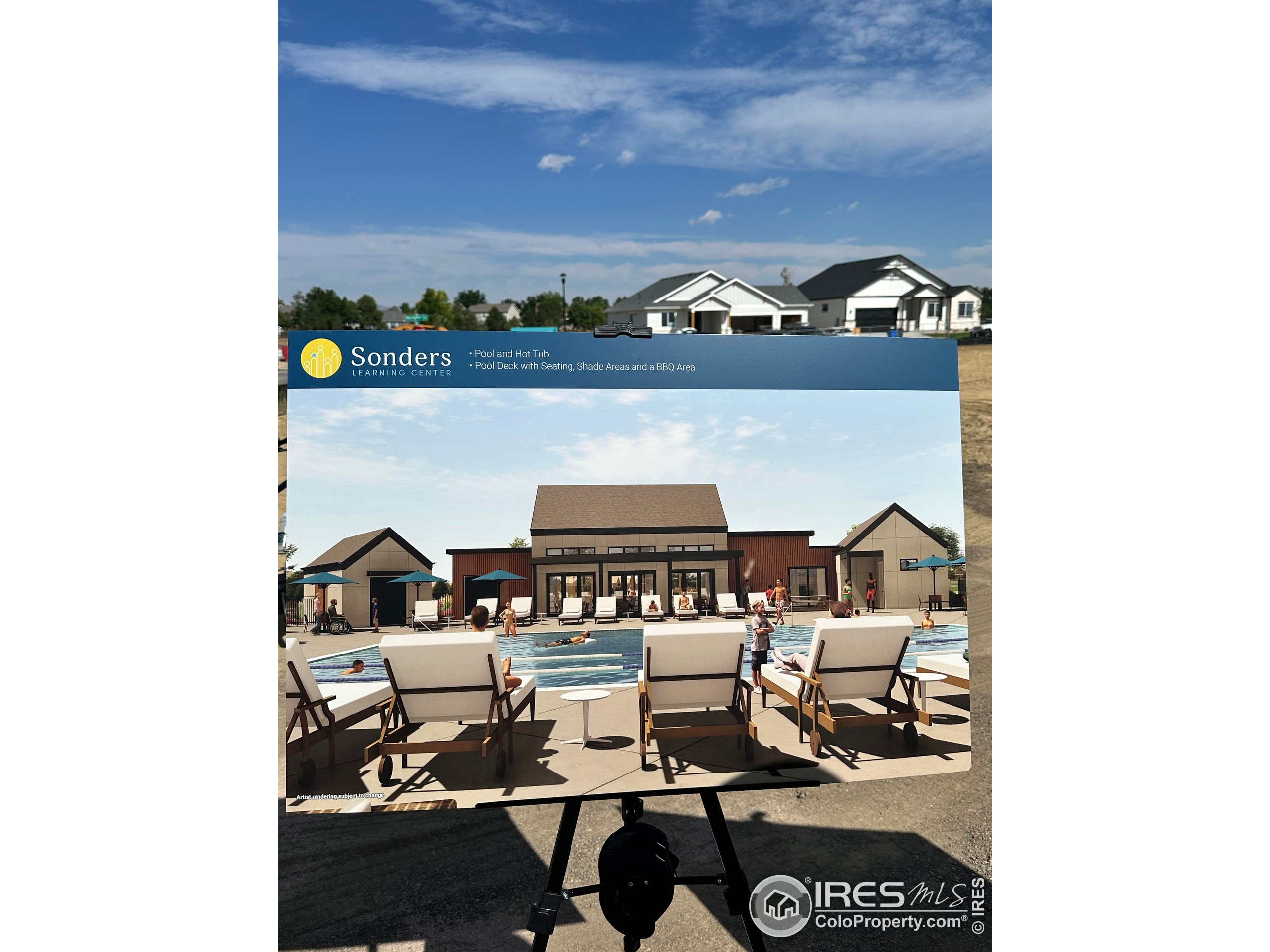 1726 Morningstar Way Fort Collins, CO 80524 - Photo 26 of 29 a living room with furniture and lamp