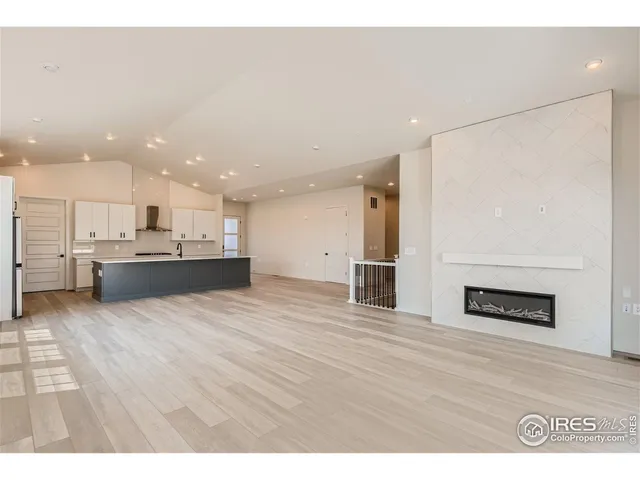 a kitchen with counter top space cabinets and appliances