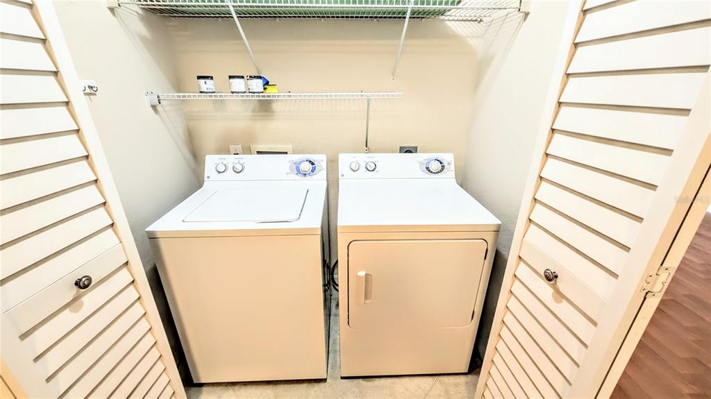 5174 Northridge Road, Unit 102 Sarasota, FL 34238 - Photo 11 of 39 a utility room with dryer and washer