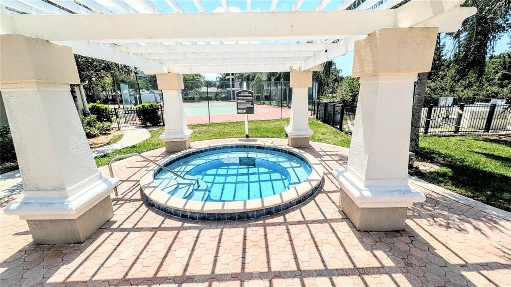 5174 Northridge Road, Unit 102 Sarasota, FL 34238 - Photo 26 of 39 a view of a swimming pool with a patio