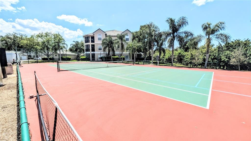 5174 Northridge Road, Unit 102 Sarasota, FL 34238 - Photo 30 of 39 a view of a tennis court