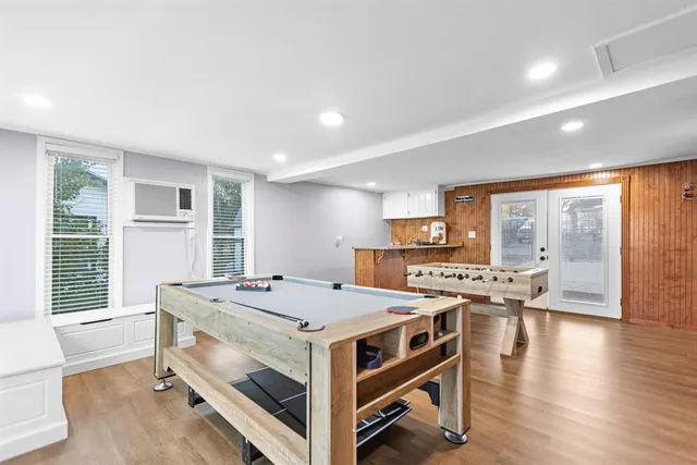 a bed room with furniture and a window