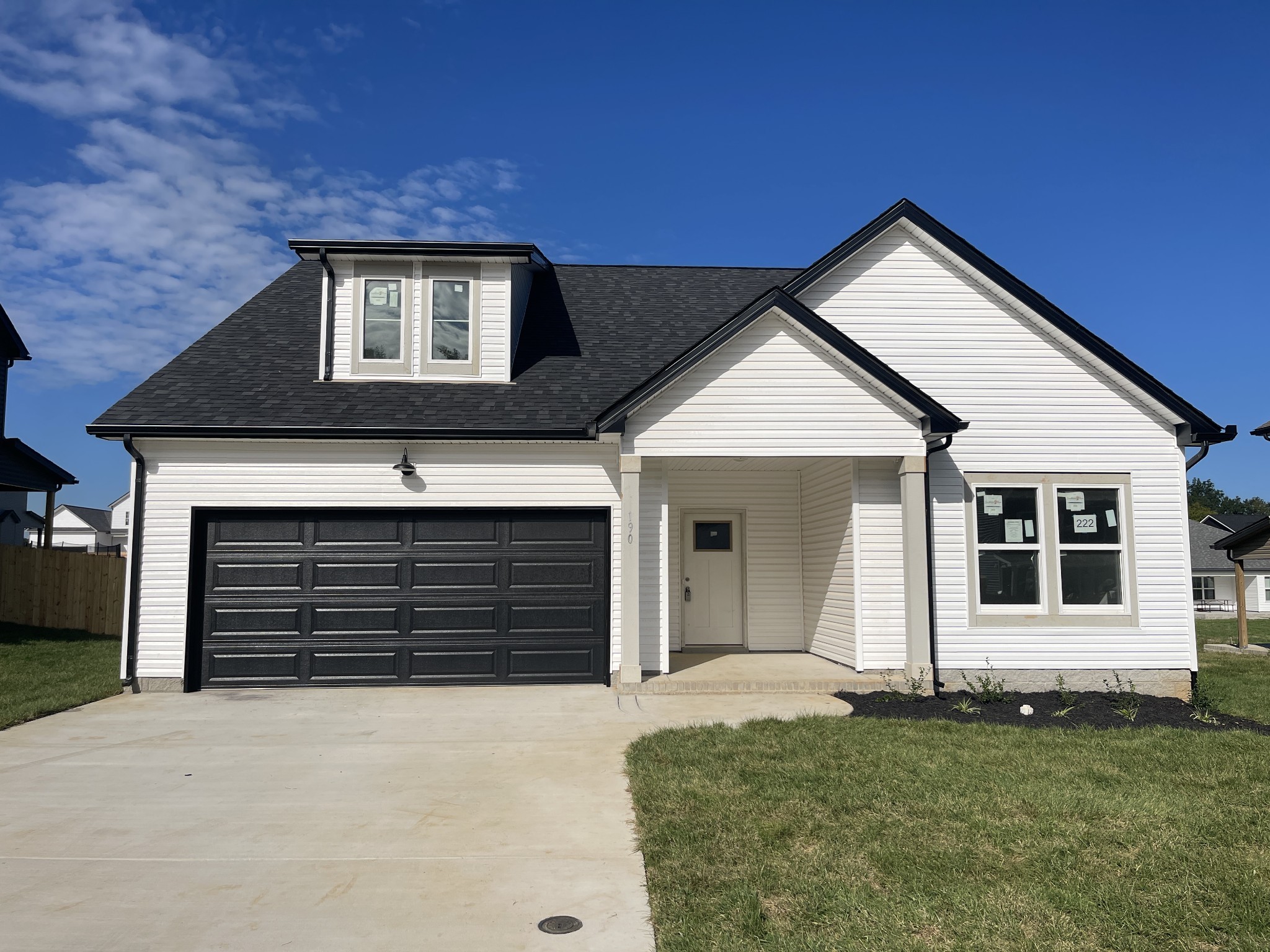 146 Cherry Road Clarksville, TN 37042 - Photo 1 of 13 a front view of a house with a yard and garage