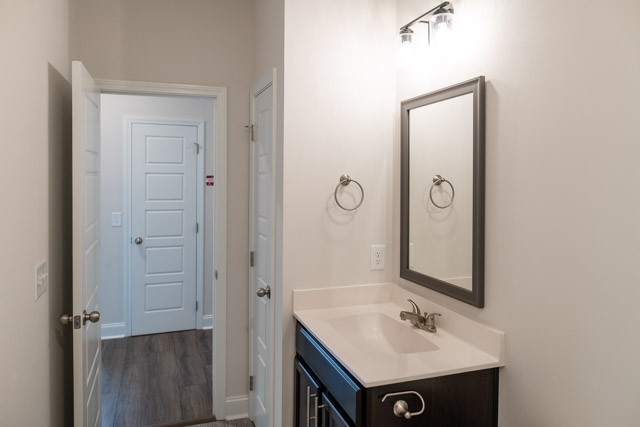 146 Cherry Road Clarksville, TN 37042 - Photo 13 of 13 a bathroom with a sink vanity and mirror