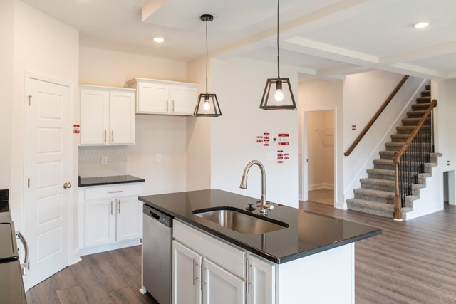 146 Cherry Road Clarksville, TN 37042 - Photo 4 of 13 a kitchen with stainless steel appliances granite countertop a sink a stove a refrigerator and island with wooden floor