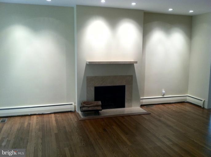 1408 Ruxton Road Towson, MD 21204 - Photo 2 of 29 Living Room with wood-burning fireplace