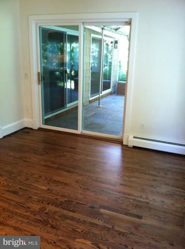 1408 Ruxton Road Towson, MD 21204 - Photo 10 of 29 Library off the dining room has patio access