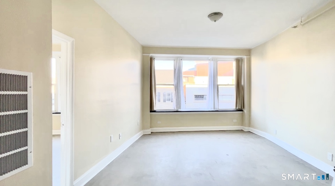 77 Bank Street, Unit 2B Waterbury, CT 06702 - Photo 11 of 11 a view of room with window