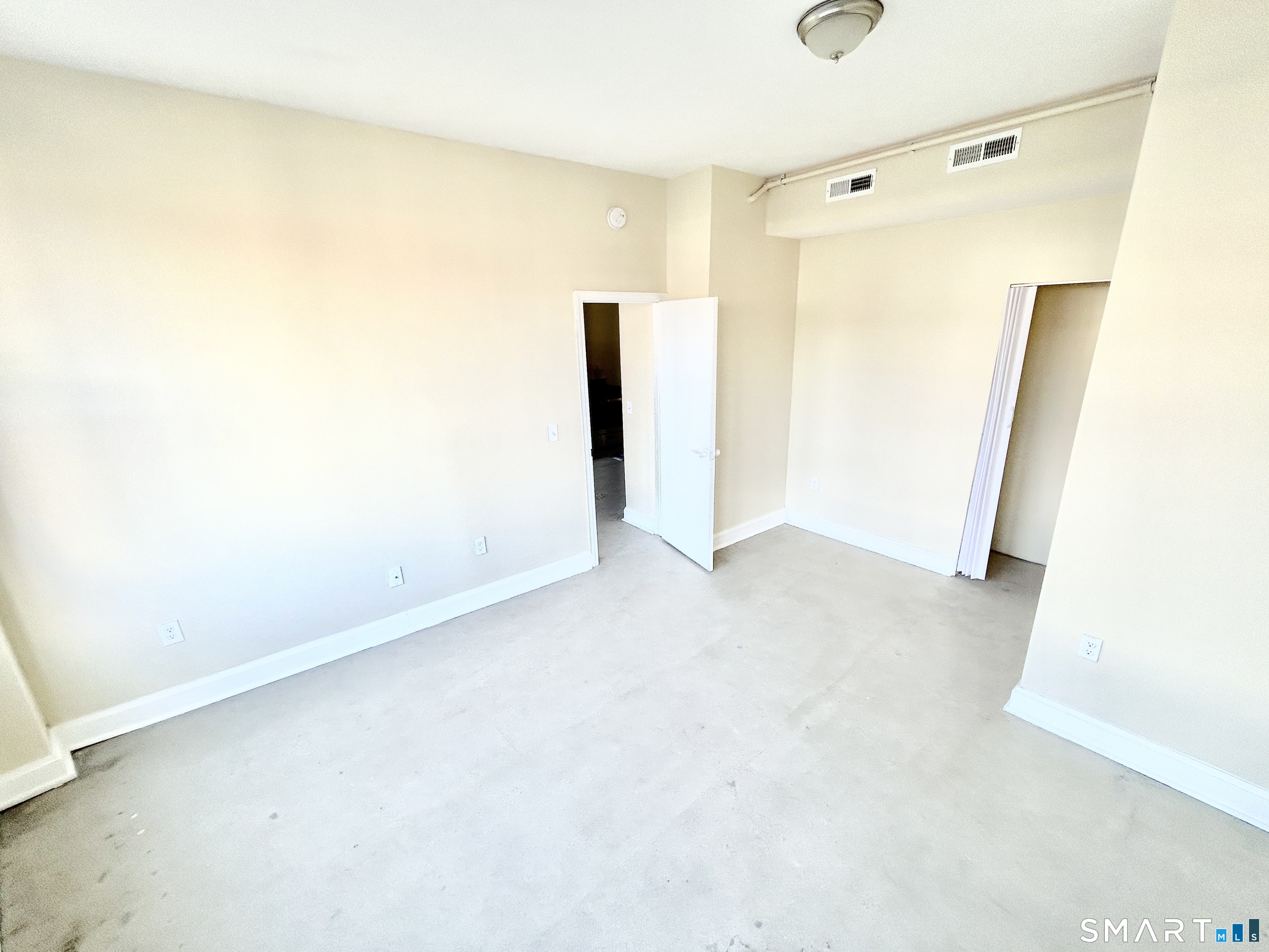 77 Bank Street, Unit 2B Waterbury, CT 06702 - Photo 6 of 11 a view of an empty room