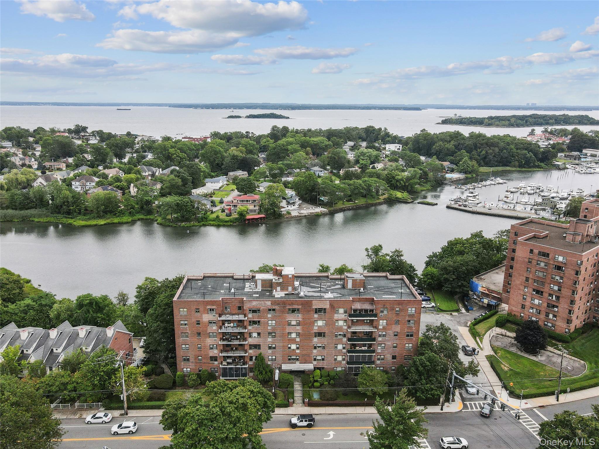 an aerial view of a city and lake view