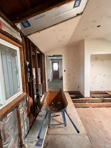 a room with lots of furniture and mirrors