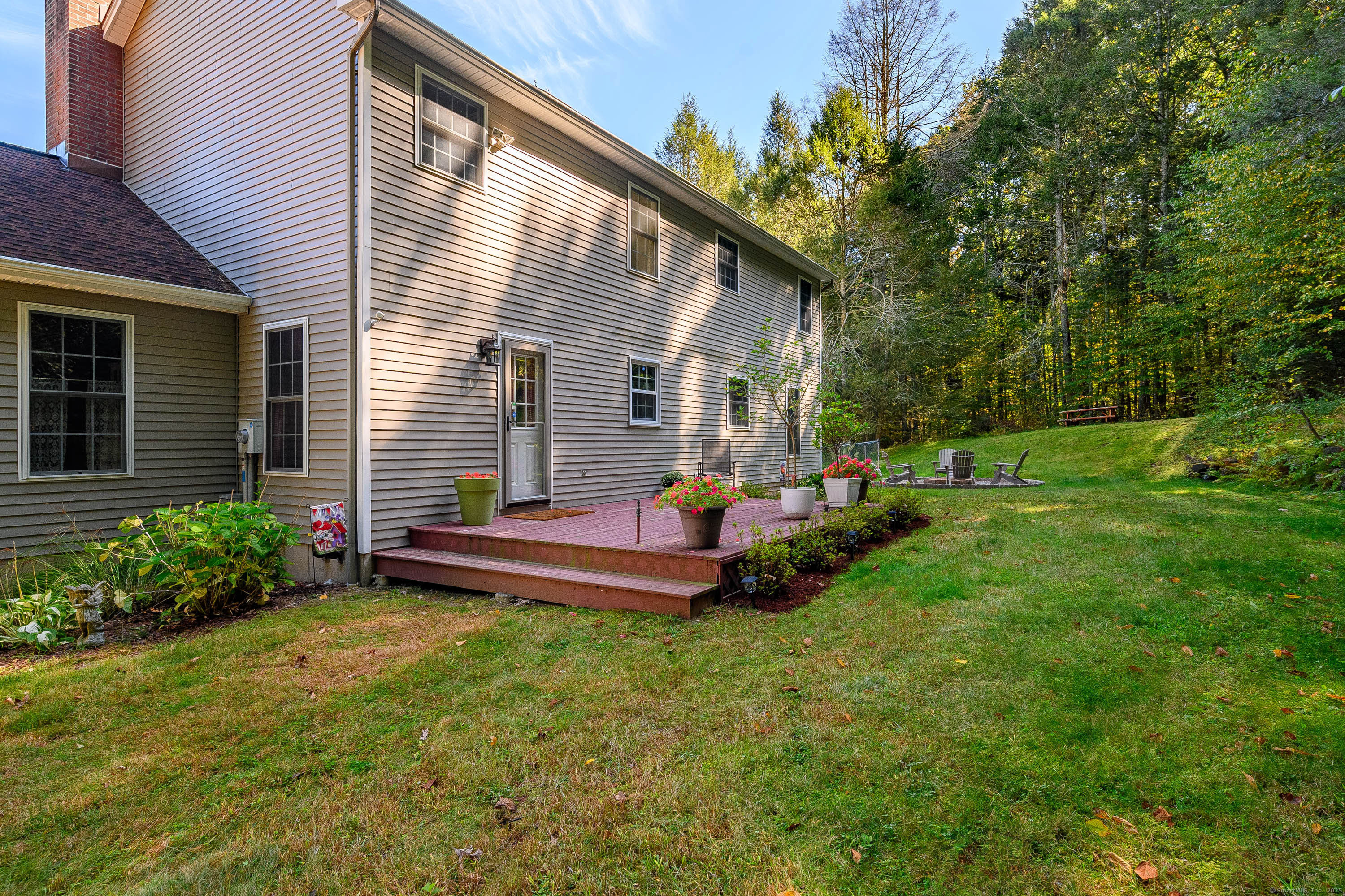 27 Pole Bridge Road Newtown, CT 06482 - Photo 13 of 39 a view of a house with backyard and sitting area