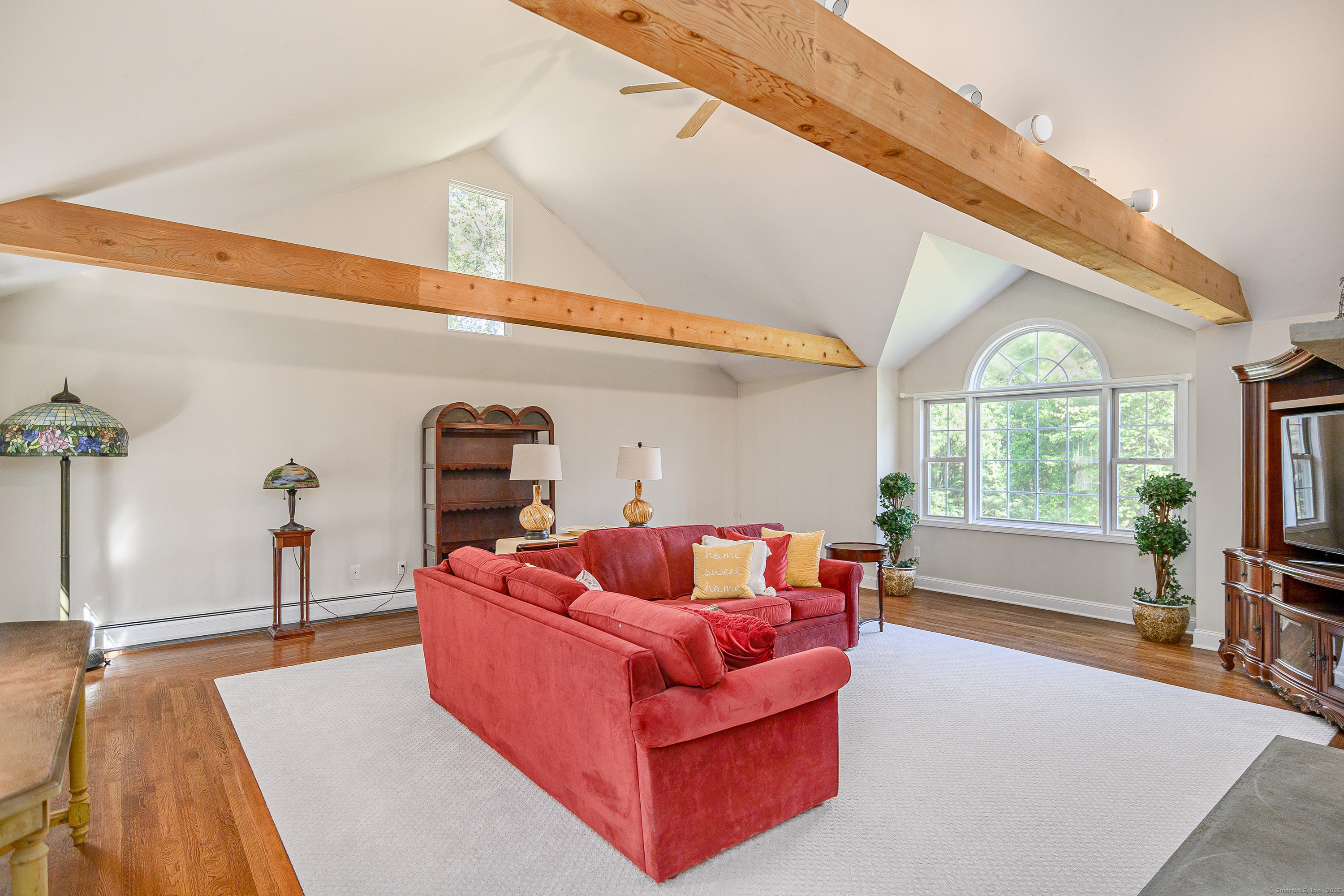 27 Pole Bridge Road Newtown, CT 06482 - Photo 15 of 39 a living room with furniture and a large window