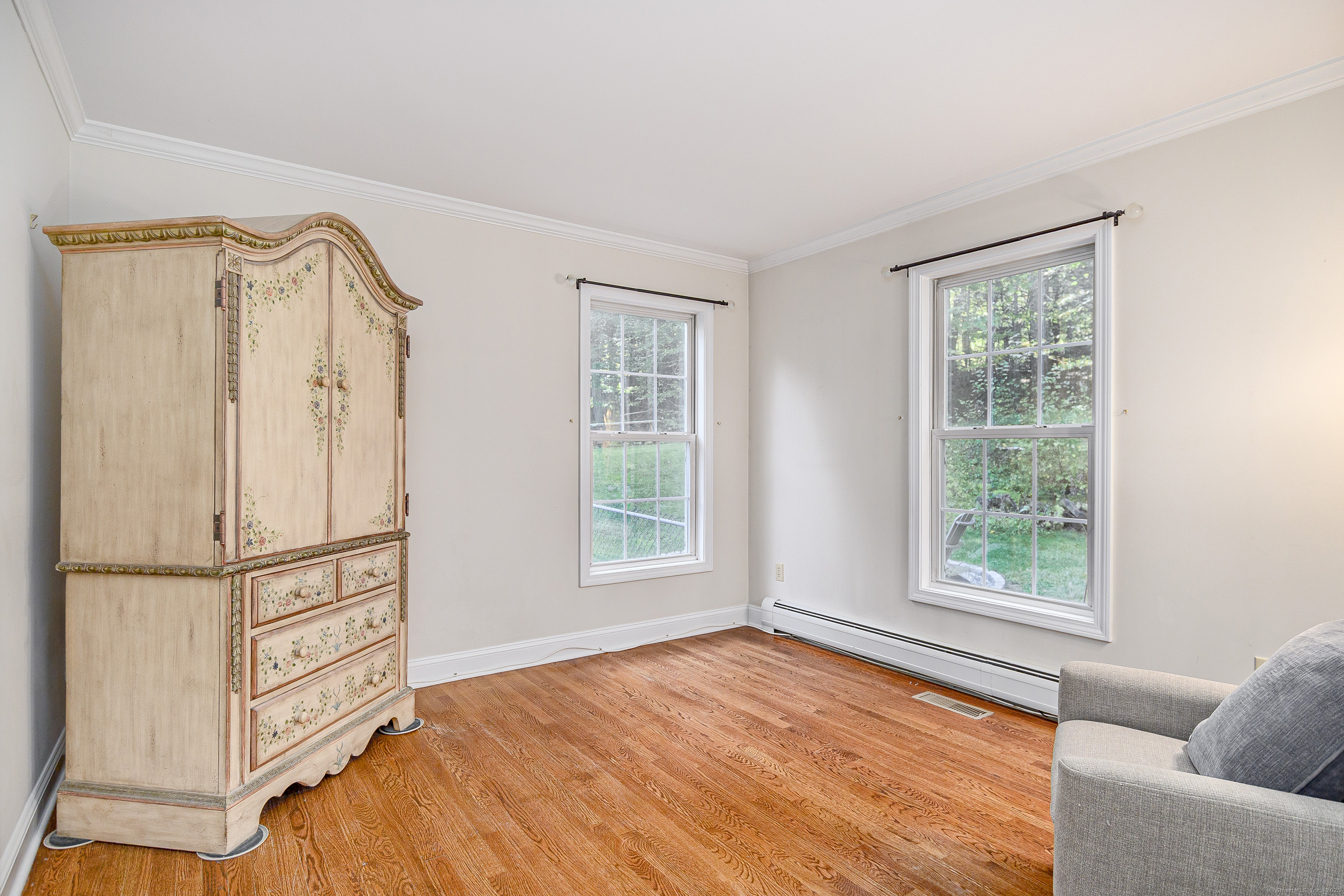 27 Pole Bridge Road Newtown, CT 06482 - Photo 18 of 39 a view of a livingroom with furniture wooden floor and window