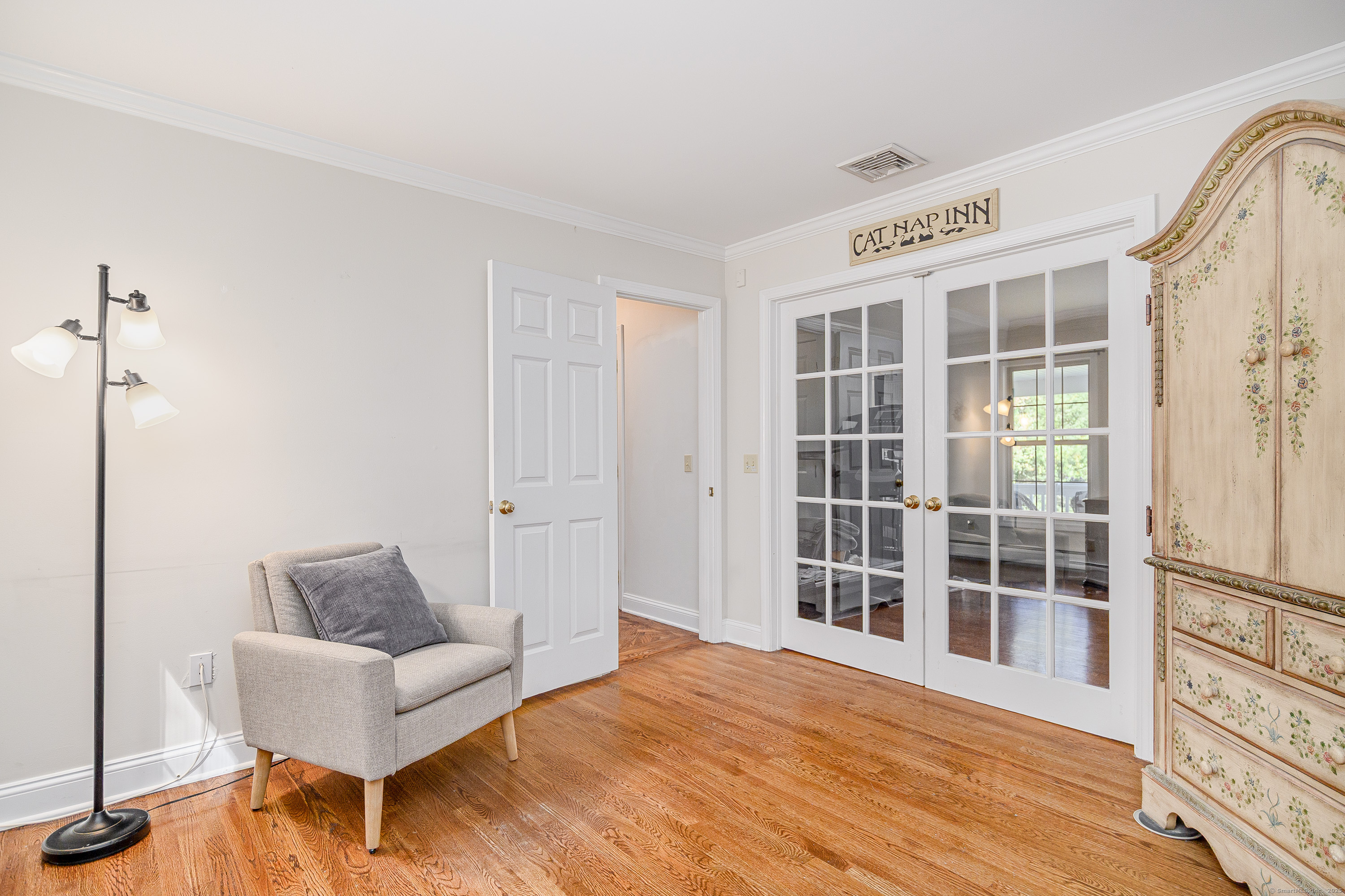 27 Pole Bridge Road Newtown, CT 06482 - Photo 19 of 39 a view of a livingroom with furniture and windows