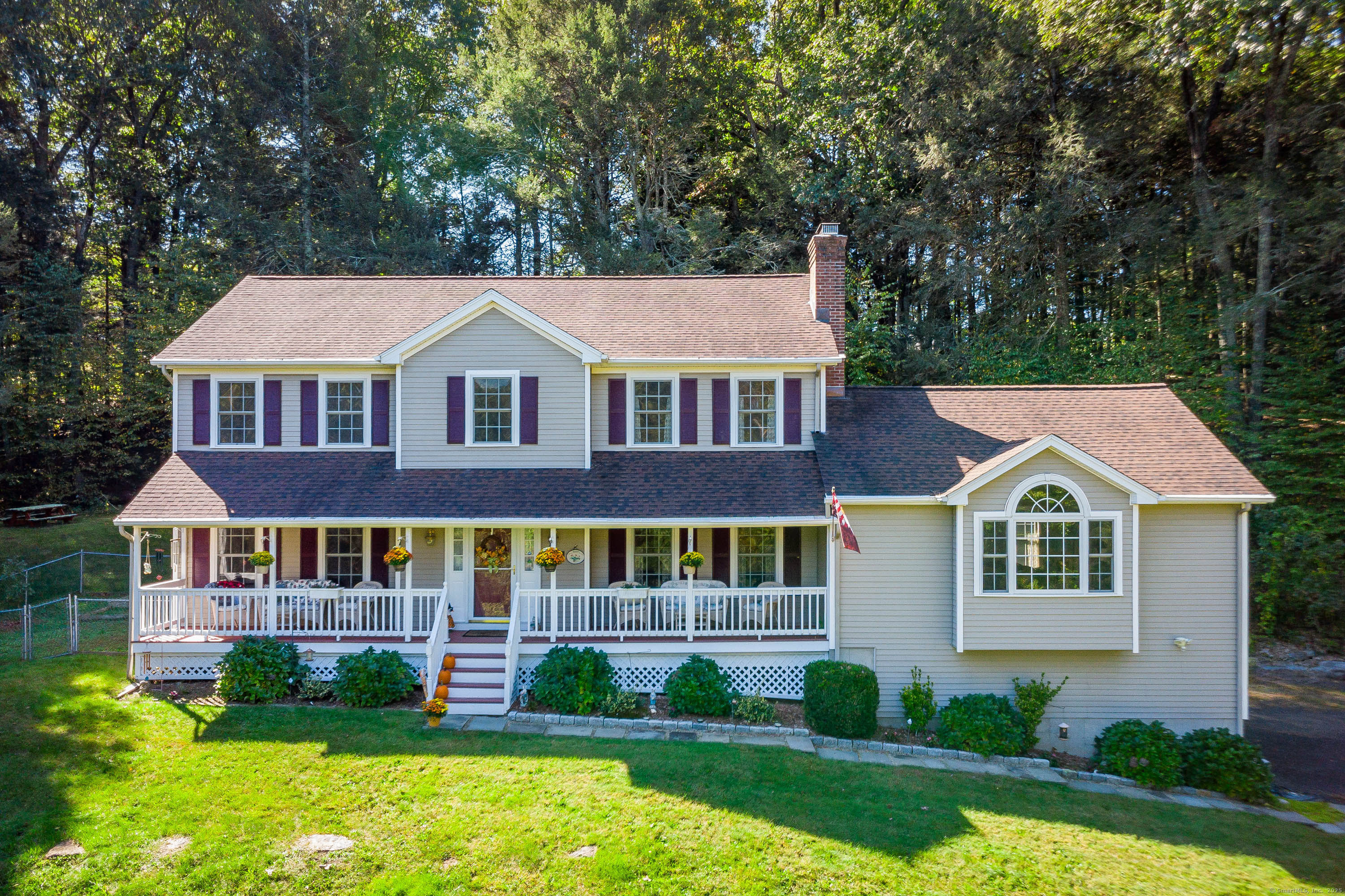 27 Pole Bridge Road Newtown, CT 06482 - Photo 2 of 39 a front view of a house with garden