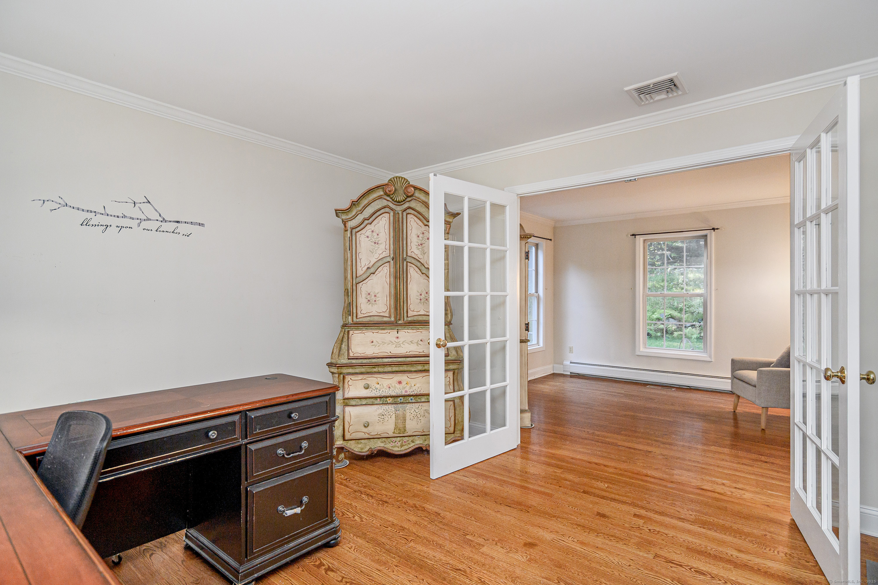 27 Pole Bridge Road Newtown, CT 06482 - Photo 21 of 39 wooden floor and windows in a room