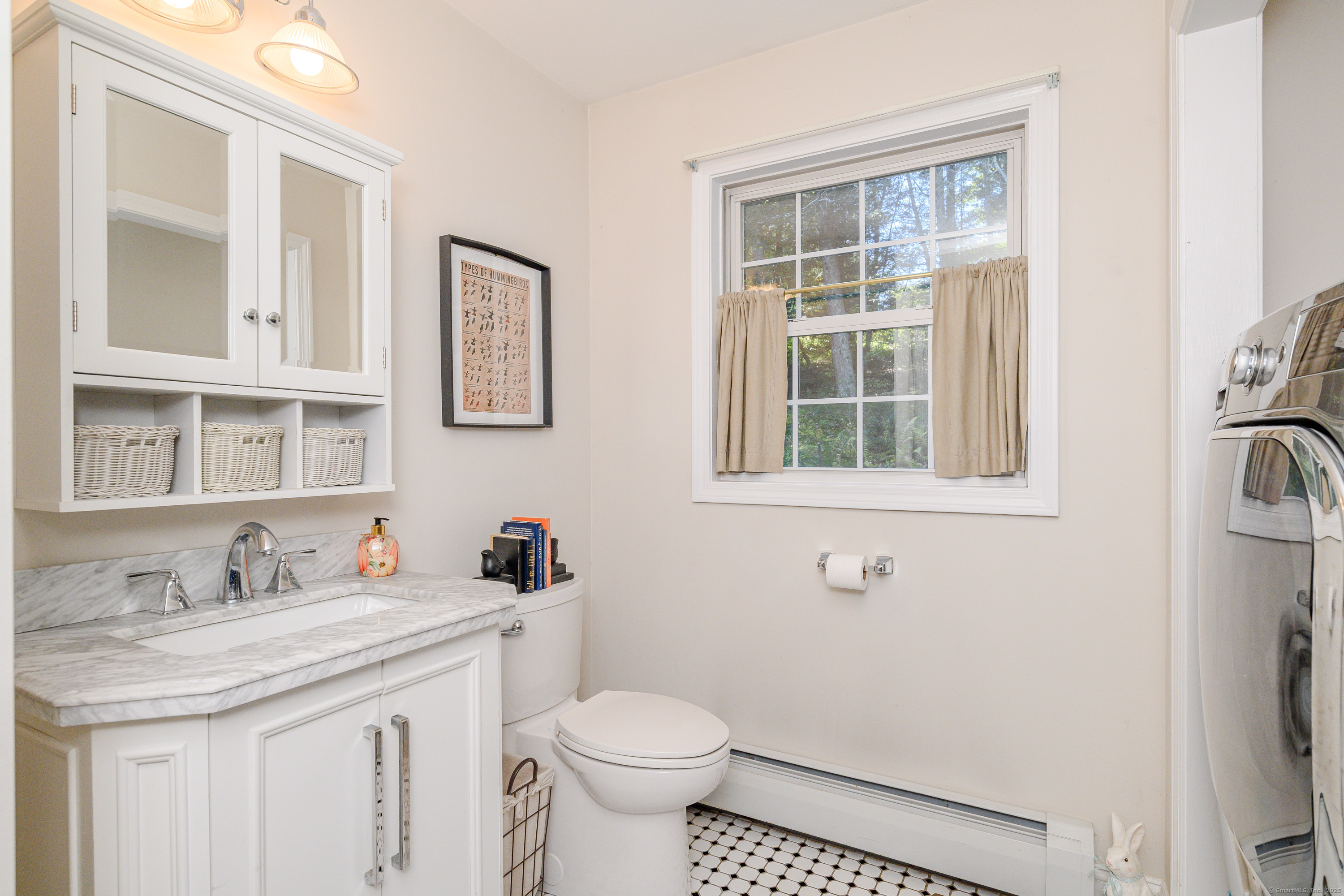 27 Pole Bridge Road Newtown, CT 06482 - Photo 22 of 39 a bathroom with a granite countertop toilet sink and mirror