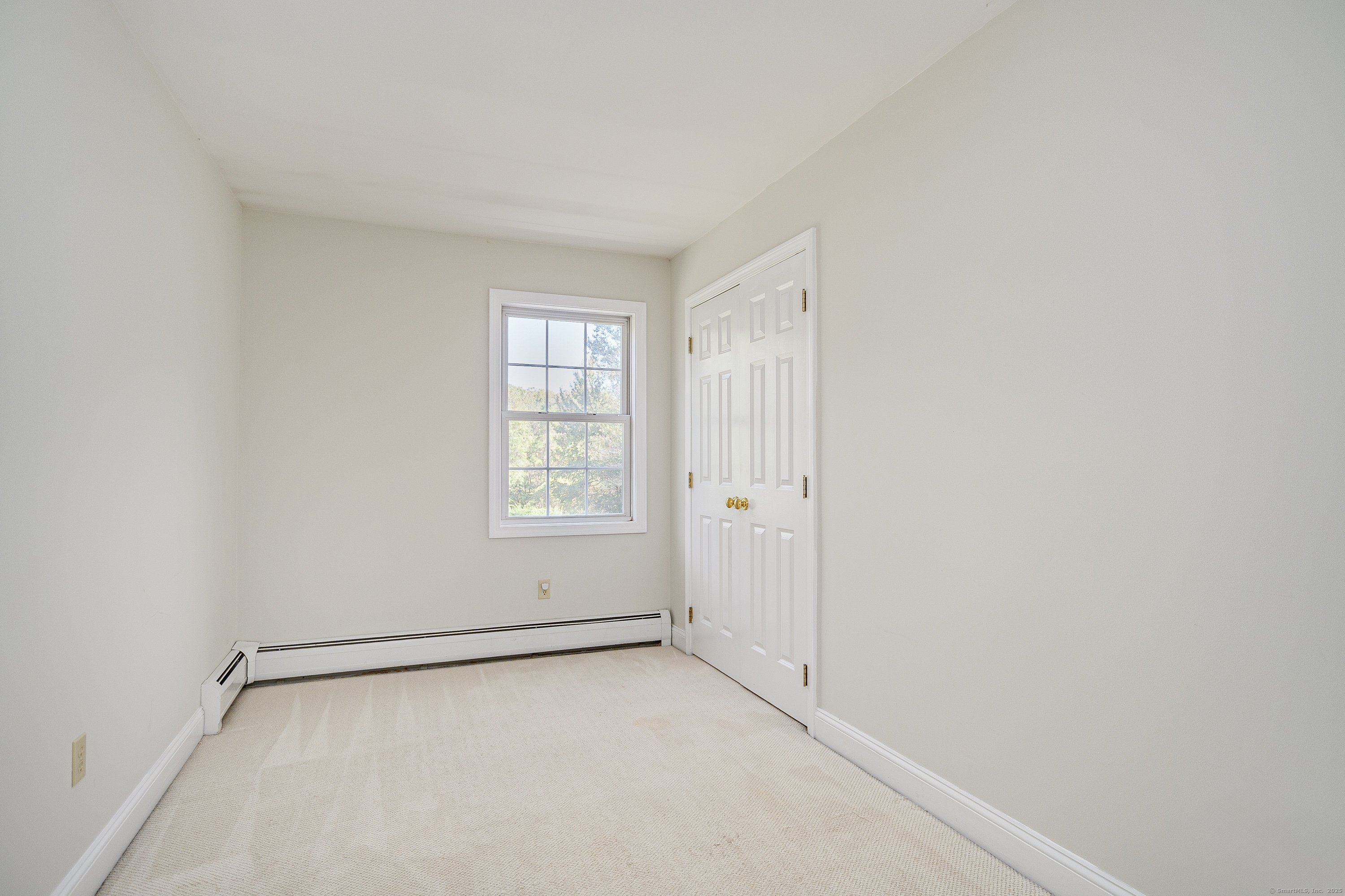 27 Pole Bridge Road Newtown, CT 06482 - Photo 25 of 39 an empty room with a window