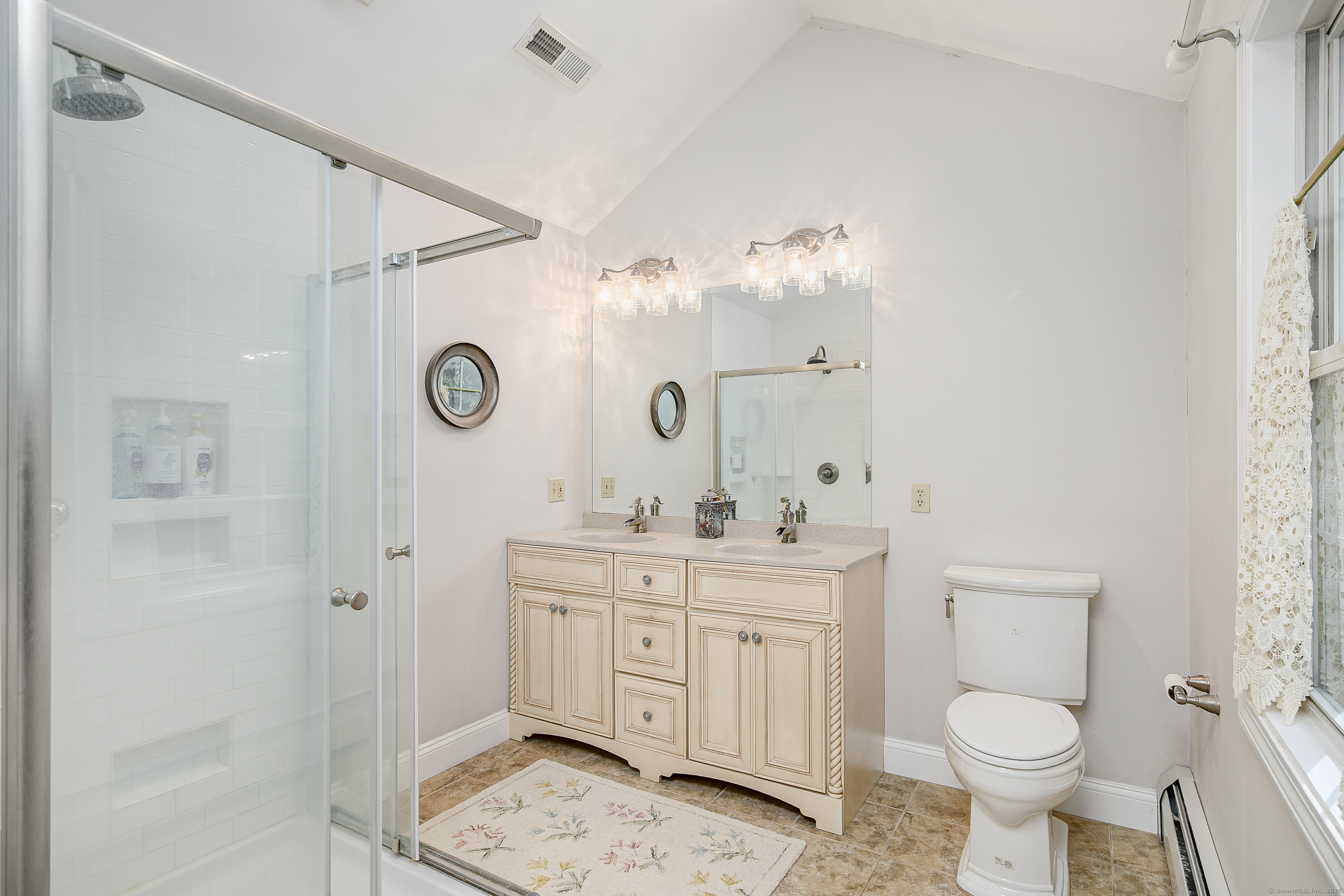 27 Pole Bridge Road Newtown, CT 06482 - Photo 28 of 39 a bathroom with a toilet sink and mirror