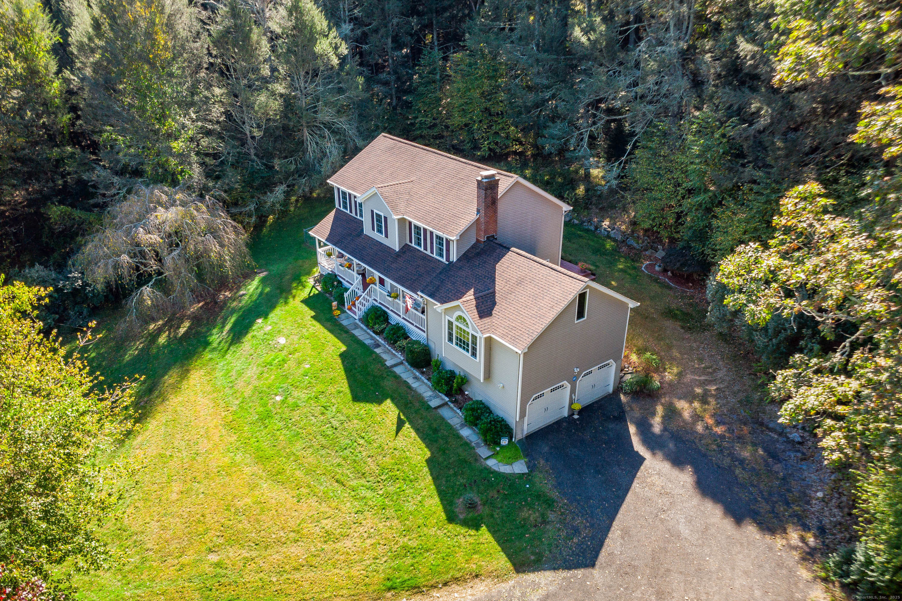 27 Pole Bridge Road Newtown, CT 06482 - Photo 34 of 39 a view of a house with a yard