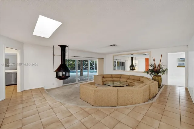 a living room with furniture and a couch