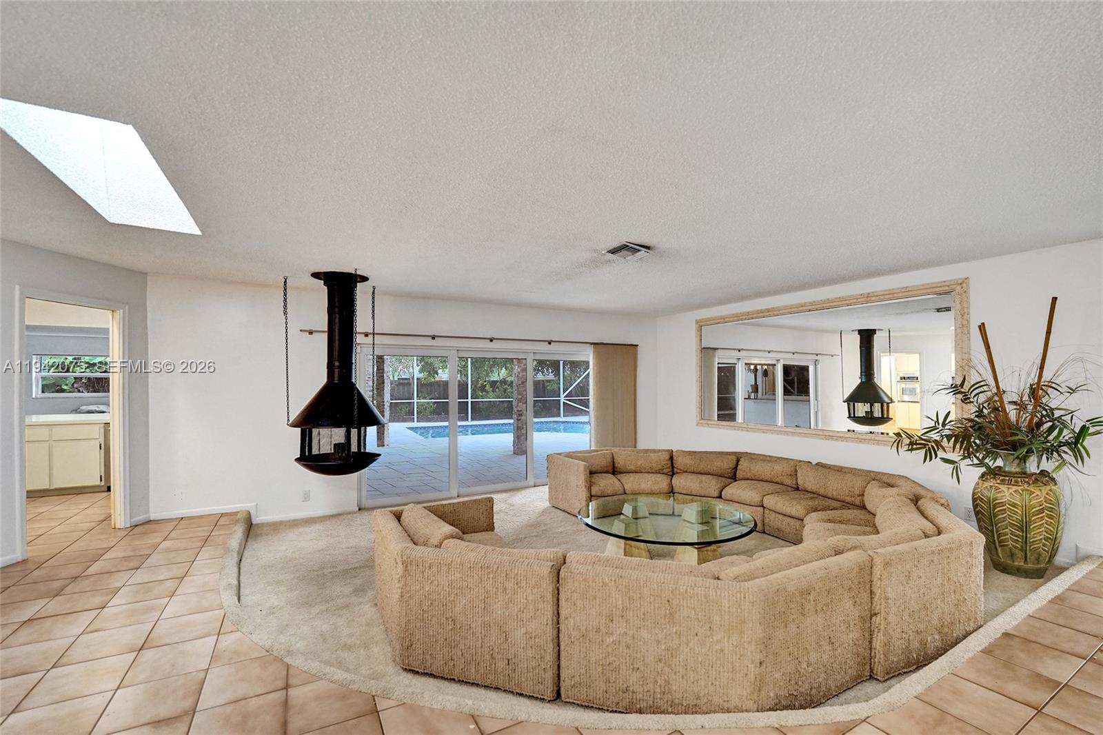 7420 Southwest 13th Street Plantation, FL 33317 - Photo 14 of 68 a living room with furniture and a couch